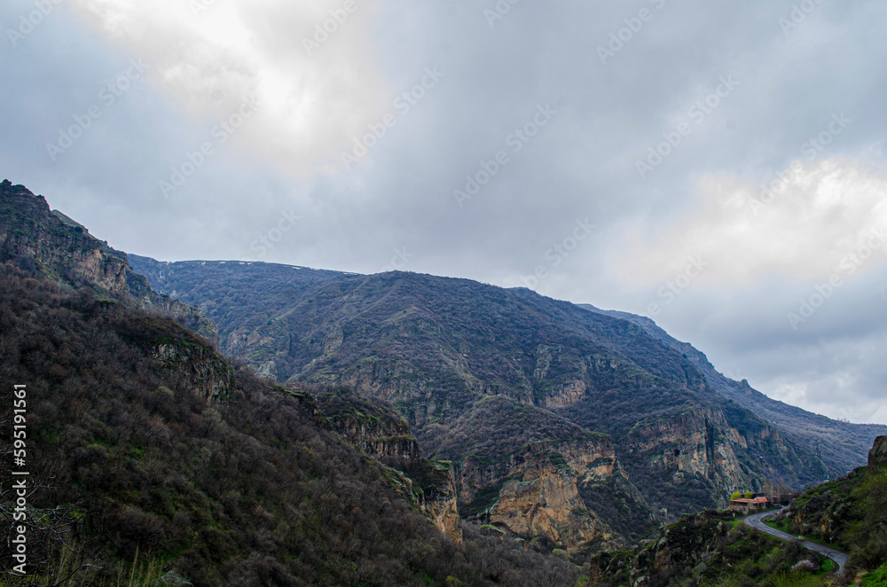 Naklejka premium clouds over the mountains