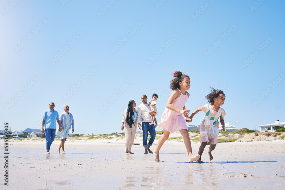 Family, beach and children running with space for mockup in summer for adventure, love and travel together. Men, women and girl kids by ocean with parents, grandparents and mock up with blue sky