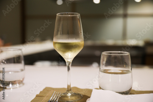 refinement and indulgence, a fancy wine glass in a restaurant represents a celebration of taste, culture, and socializing. It evokes feelings of luxury, pleasure, and conviviality