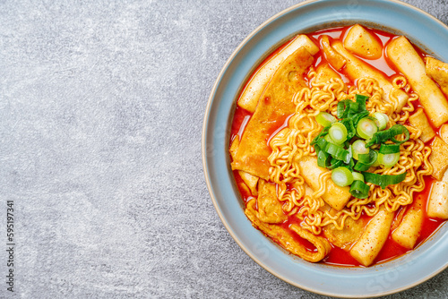 Rabokki, Korean style Stir-fried Instant Noodle : This dish is tteokbokki with ramen noodles. Tteokbokki is a spicy dish made with rice cake, vegetables, and fish cake, all stir-fried together in a go photo