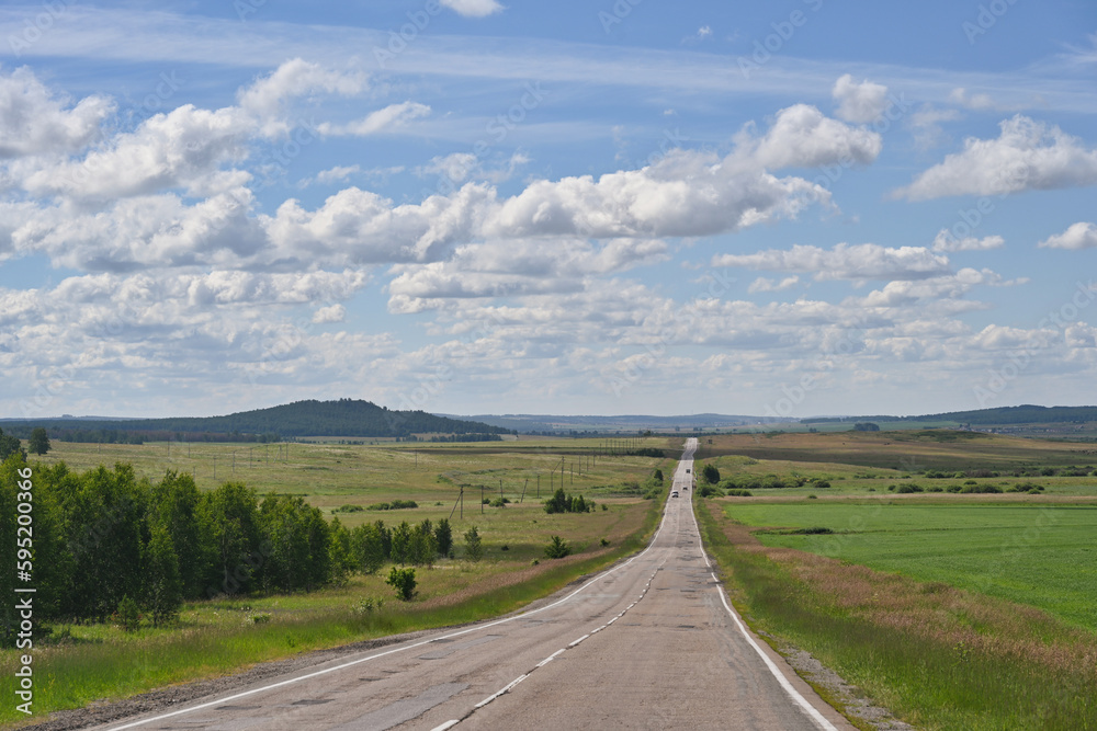 Empty road through the fields of Bashkiria