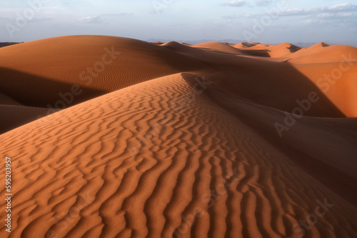 Sunset on ripples on Sand Dunes of Wahiba Sands Desert  Oman