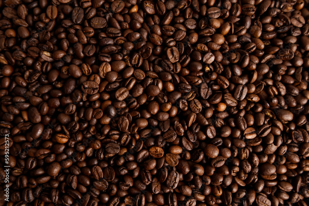 Roasted coffee beans closeup texture background Roasted coffee beans closeup texture background
