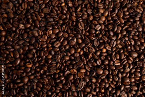 Roasted coffee beans closeup texture background