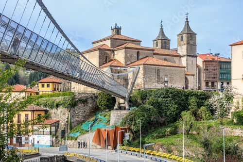 Suspension bridge, for the passage of people, and cross the Narcea river in Cangas del Narcea, Asturias, Spain photo