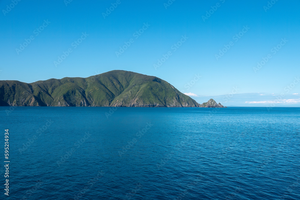 Gorgeous landscapes along the Queen Charlotte Sound (Totaranui), the easternmost of the Marlborough sounds, in New Zealand's South Island.
