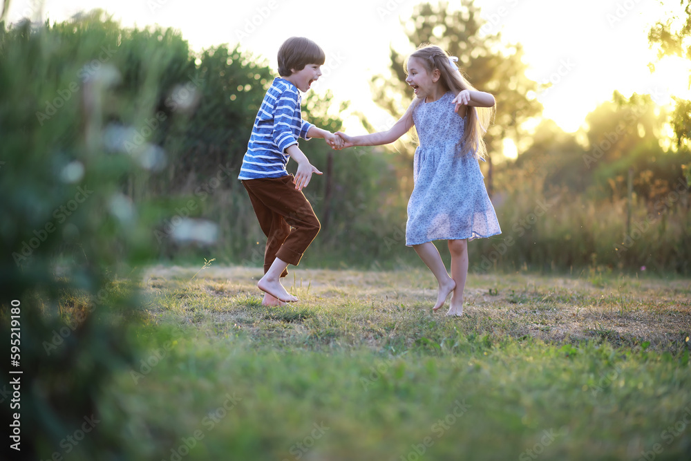 Children walk in the summer in nature. Child on a sunny spring morning in the park. Traveling with children. Children walk in the summer in nature. Child on a sunny spring morning in the park. Traveling with children.