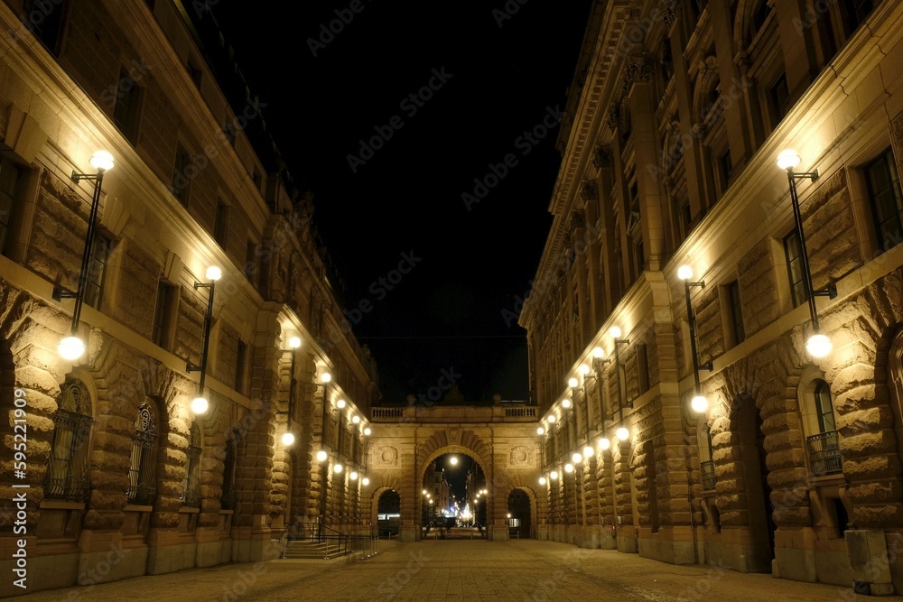 Beautiful scenery of illuminated Stockholm by night. Gate of Parliament House, Swedish: Riksdagshuset. Sweden