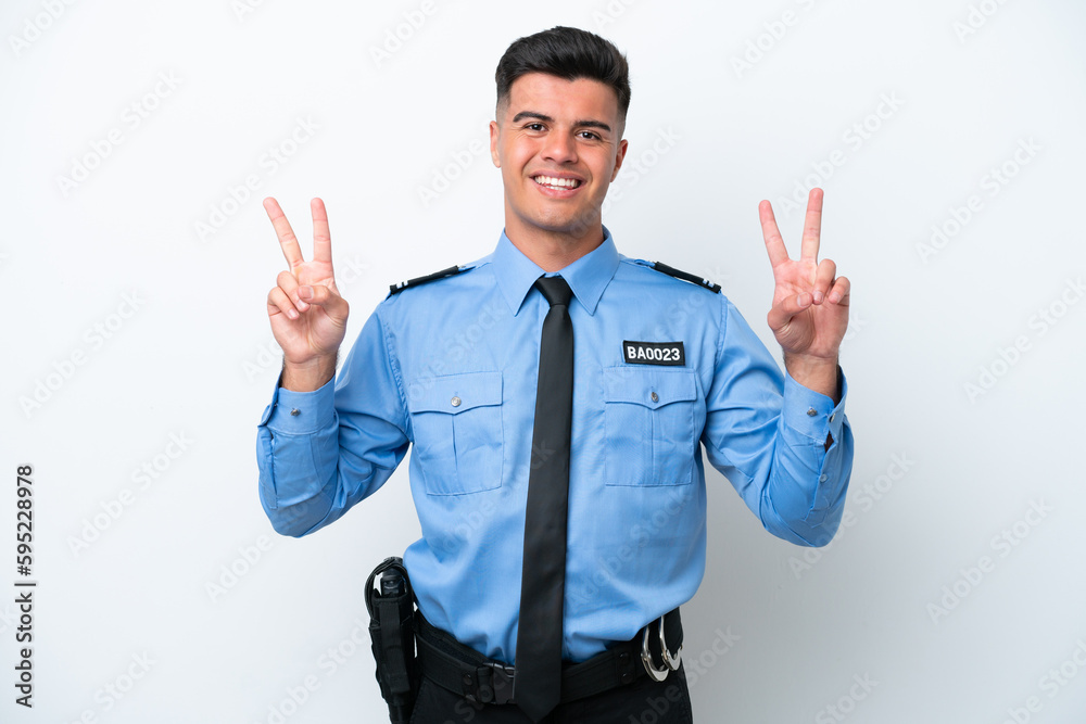 Young police caucasian man isolated on white background showing victory sign with both hands Young police caucasian man isolated on white background showing victory sign with both hands