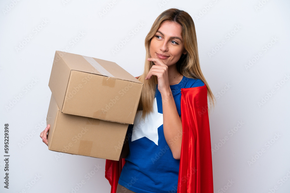 Super Hero delivery woman isolated on white background looking to the side and smiling Super Hero delivery woman isolated on white background looking to the side and smiling