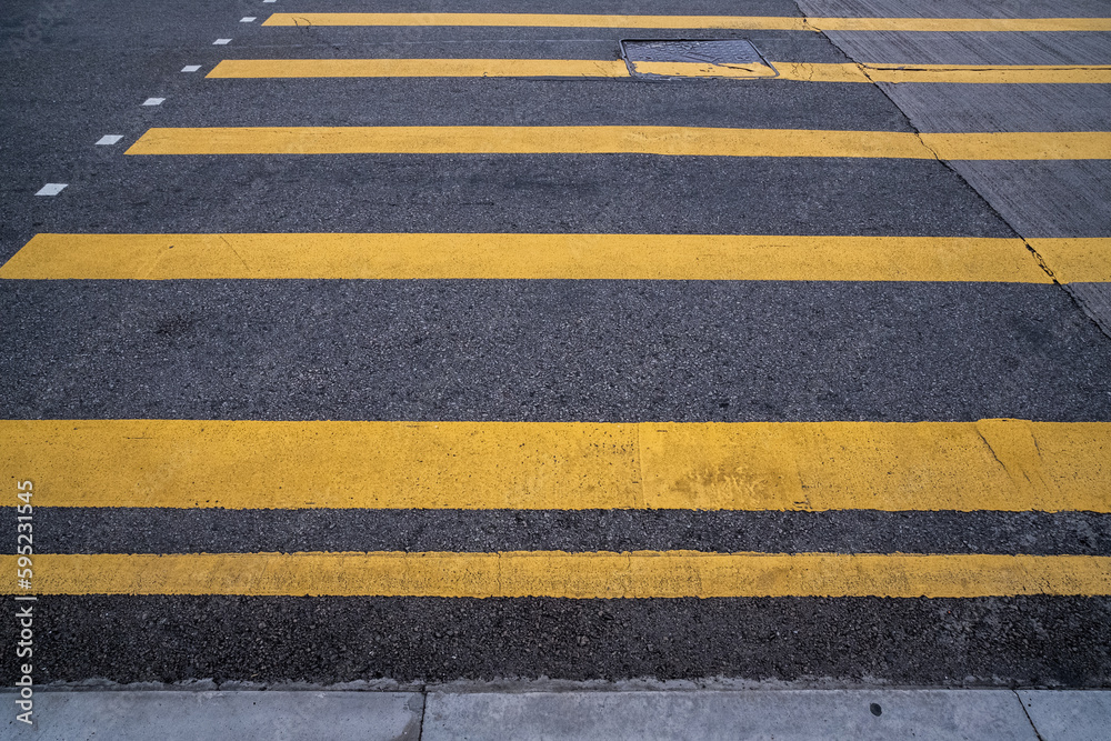 Fototapeta premium Yellow lines on asphalt road