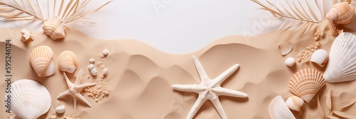 Sea sand with starfish and shells, palm leaf. Summer beach background.