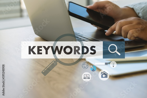 businessmanman search website for content keywords on laptop browse in office optimize seo engine