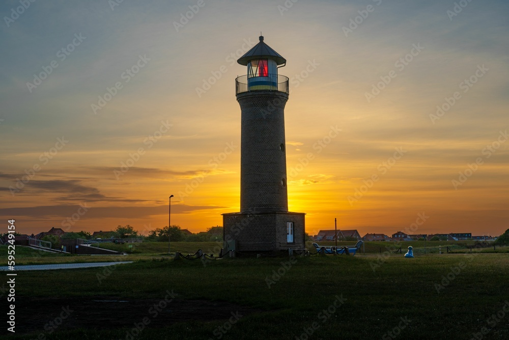Picturesque lighthouse illuminated by the setting sun