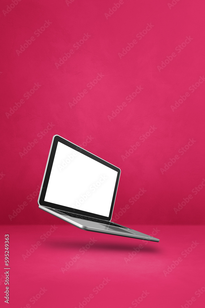 Floating computer laptop isolated on pink. Vertical background Floating computer laptop isolated on pink. Vertical background