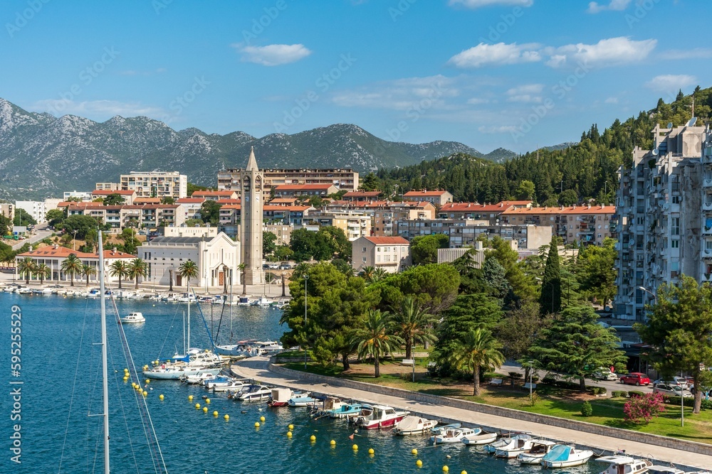 Picturesque view of a harbor featuring several boats docked in the water. Ploce, Croatia.