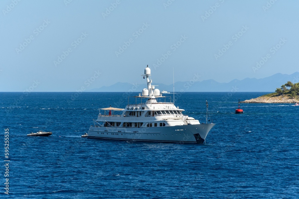 Luxury yacht sailing near the Peljesac peninsula on the coast of the Adriatic sea. Croatia.