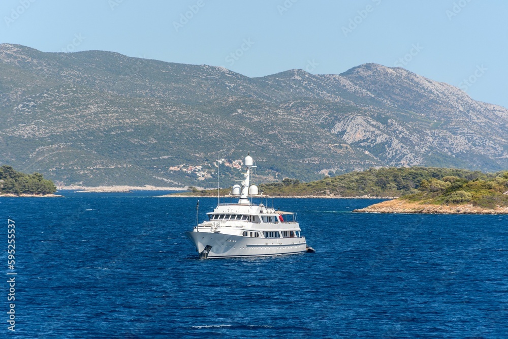 Luxury yacht sailing near the Peljesac peninsula on the coast of the Adriatic sea. Croatia.