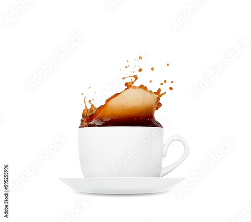 Espresso coffee in a white glass mug with a saucer. Coffee beans fly into coffee. Splashes of coffee. 