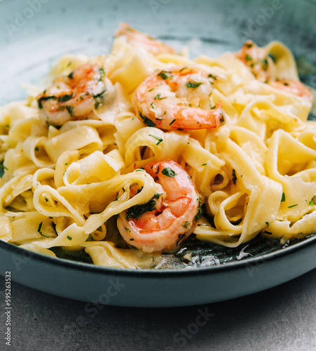 Italian pasta fettuccine or tagliatelle with shrimps