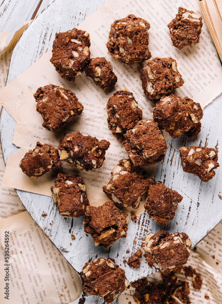 Fototapeta premium Chocolate chip cookies with hazelnuts top view