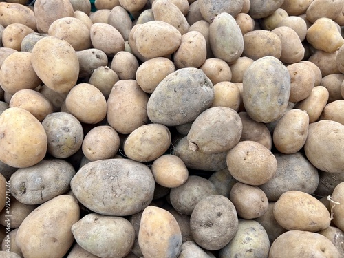 raw potatoes as a background