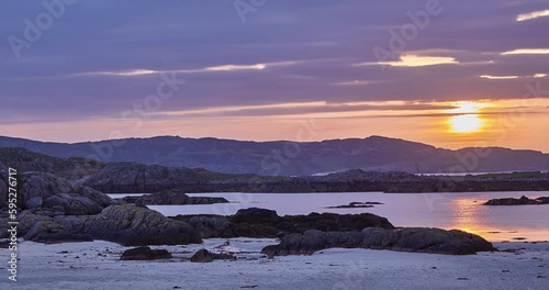 Time Lapse of Sunset at Fidden Beach on the Isle of Mull, Scotland, United Kingdom photo