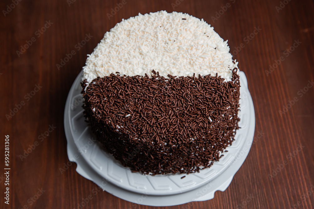 Biscuit baked cake with boiled condensed milk and chocolate. Pastry. Biscuit baked cake with boiled condensed milk and chocolate. Pastry.