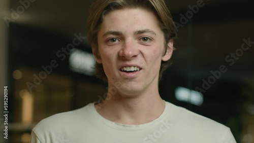 Shocked amazed guy looking at camera surprised Caucasian man client open mouth astonish shock wonder male student astonish reaction on news win. Portrait expressive delighted customer in shopping mall
