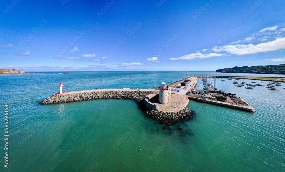 Fototapeta premium Howth Harbour Lighthouse on a bright sunny afternoon