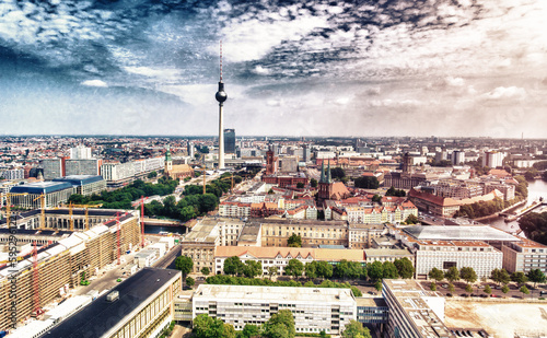 Aerial view of Berlin cityscape from drone in summer season with city landmarks and blue sky, Germany © jovannig
