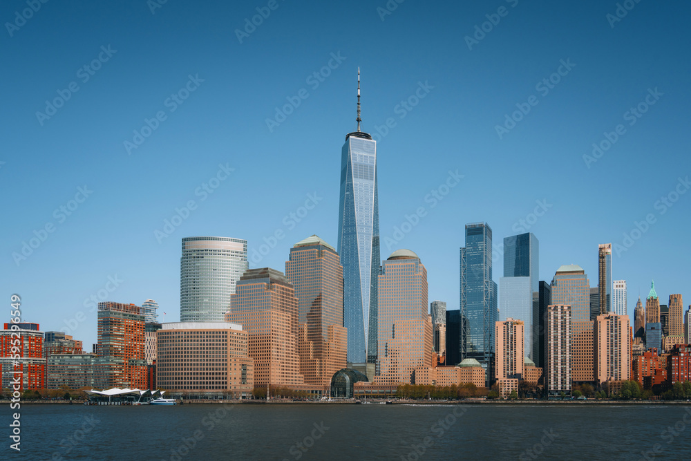 New York City Manhattan skyline with One World Trade Center Tower or Freedom Tower over Hudson River viewed from New Jersey