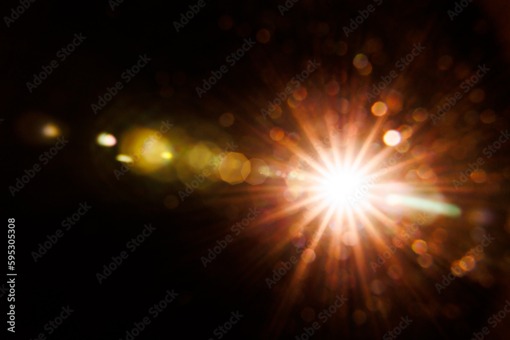 Fototapeta premium Abstract Natural Sun flare on the black