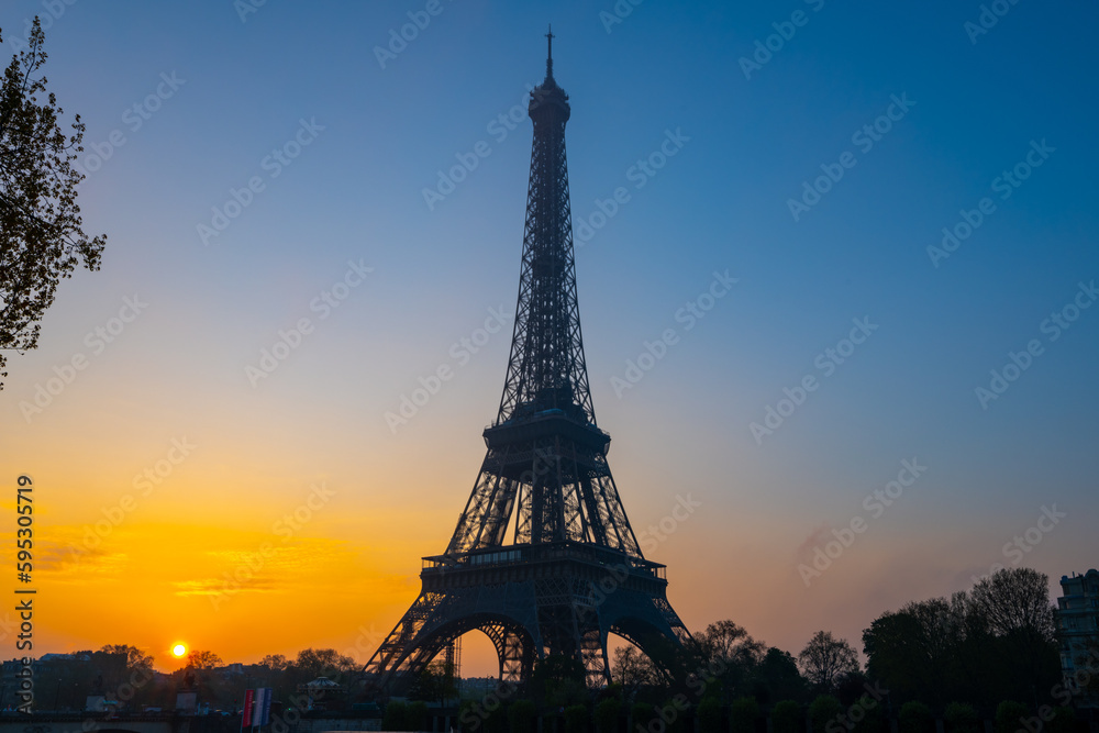 Sunrise in Paris with a silhouette of the Eiffel Tower