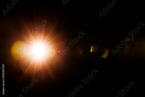 Abstract Natural Sun flare on the black