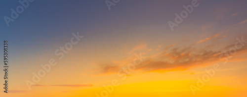 clouds and orange sky Real amazing panoramic sunrise or sunset sky with gentle colorful clouds. Long panorama  crop it