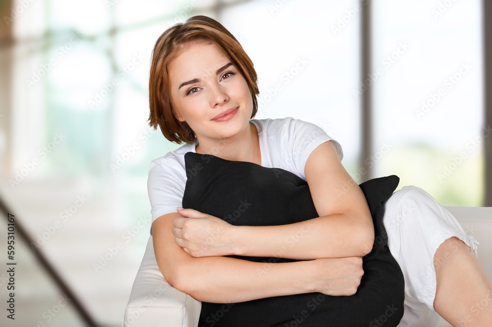 young attractive woman relaxing at home young attractive woman relaxing at home