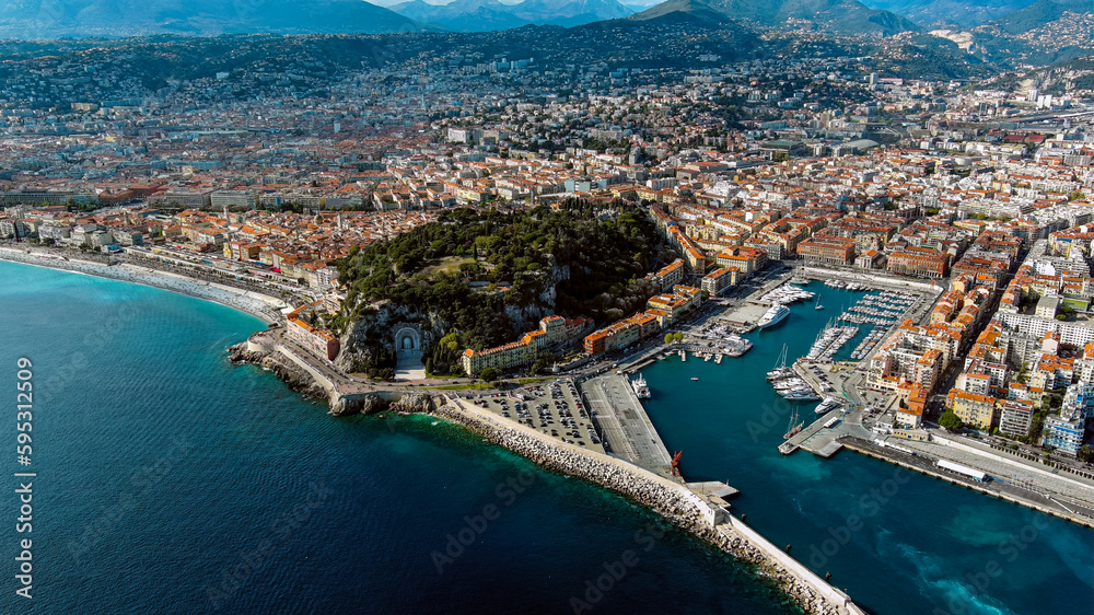 Nice, France beautiful aerial cityscape and panoramic view of harbor with luxury yachts, cruise ship in the French Riviera the southeastern coast of France on the Mediterranean Sea from above 5.5K UHD