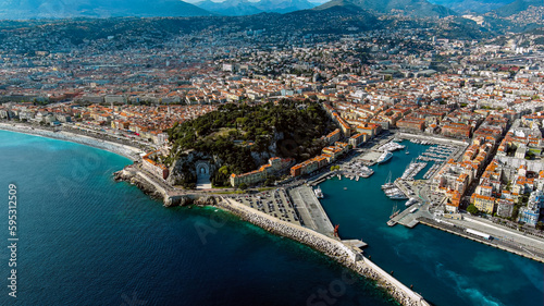 Nice, France beautiful aerial cityscape and panoramic view of harbor with luxury yachts, cruise ship in the French Riviera the southeastern coast of France on the Mediterranean Sea from above 5.5K UHD © Photo London UK