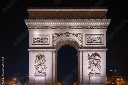 Arc de Triomphe de l Etoile at the top of the Champs-Elysees boulevard by night, Paris, France
