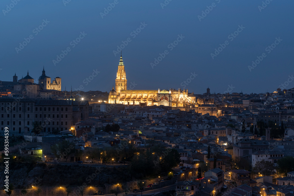 Toledo, Spain - April 9, 2023: Panoramic view of the city of Toledo at night, The Cathedral