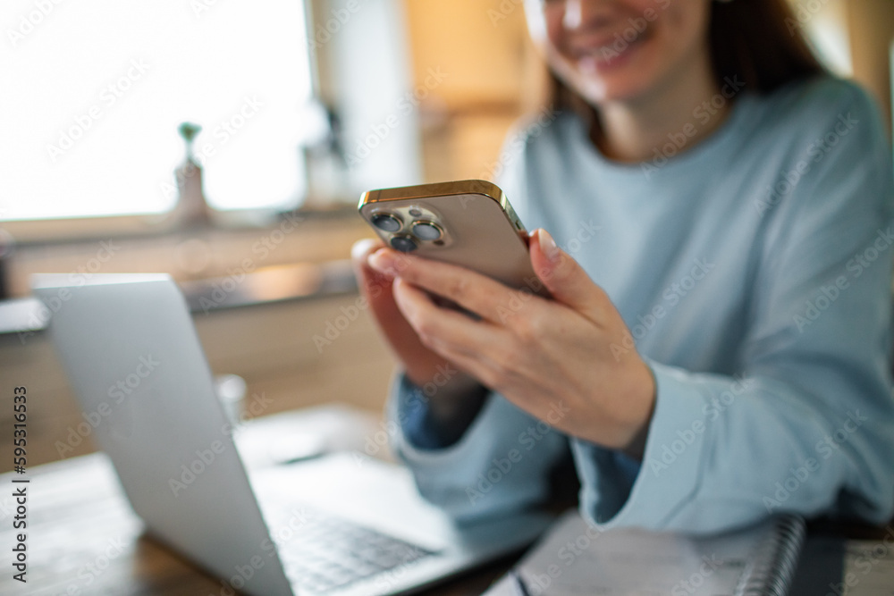 Young adult woman using her phone at home Young adult woman using her phone at home