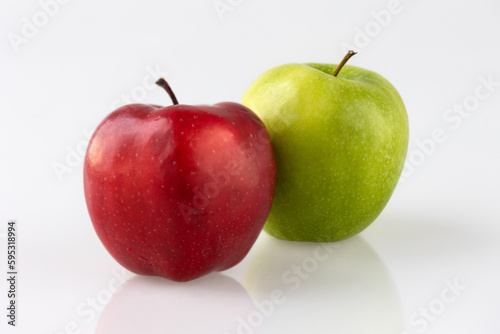 Red apple and green apple on white background