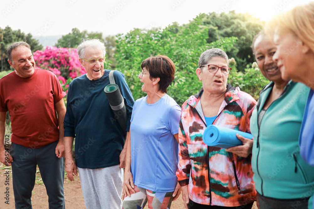 Senior people friends having fun together after exercise sport workout outdoors at park city - Joyful elderly friendship community Senior people friends having fun together after exercise sport workout outdoors at park city - Joyful elderly friendship community