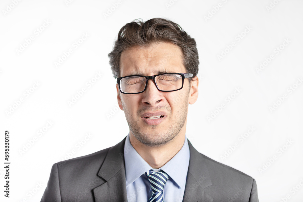 Close up portrait of depressed and tired businessman isolated on white background Close up portrait of depressed and tired businessman isolated on white background
