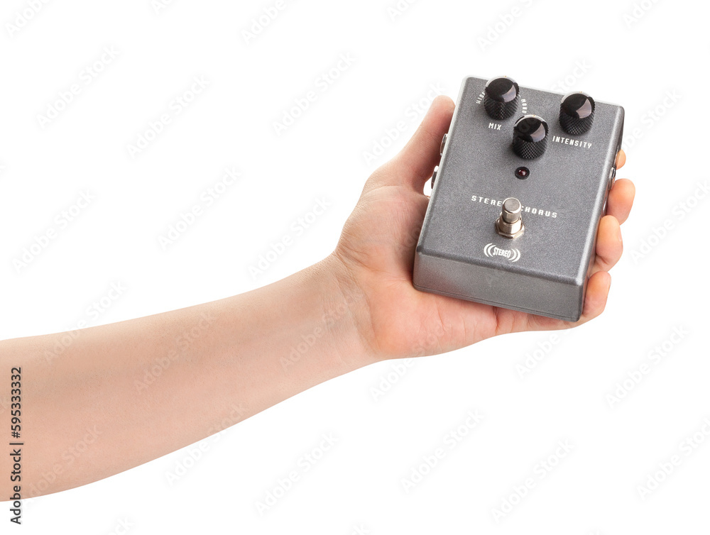 guitar pedal in hand path isolated on white guitar pedal in hand path isolated on white