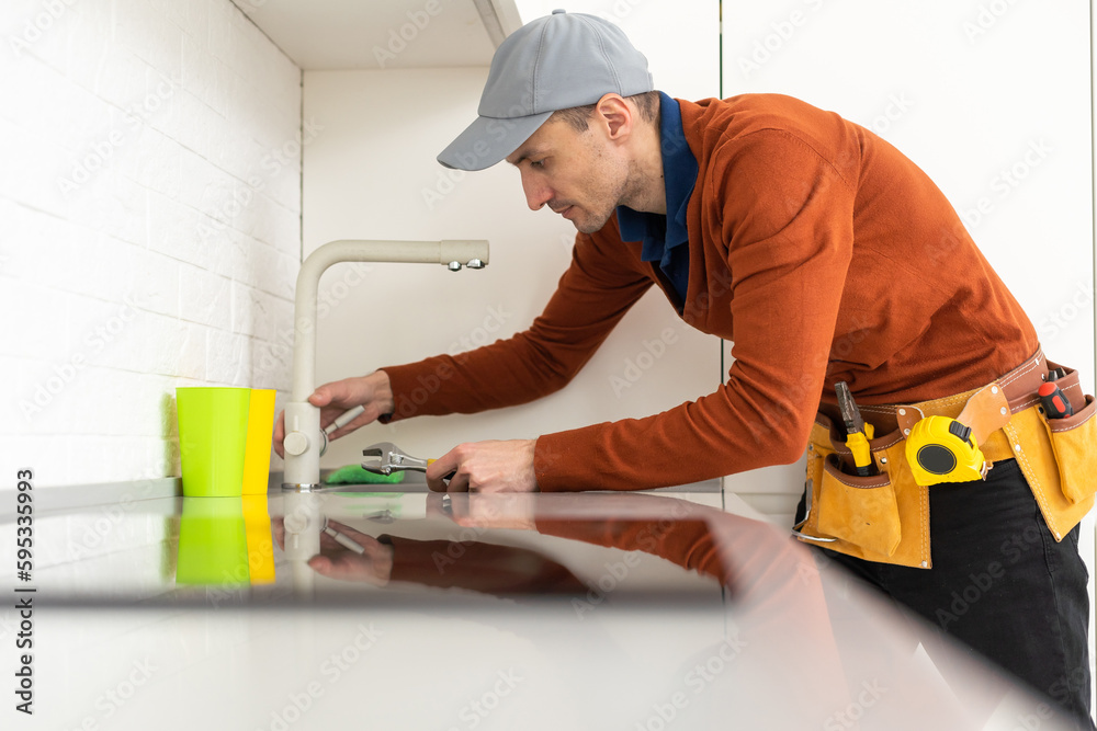 Installation of induction stove or cooktop by a master. Installation of induction stove or cooktop by a master.