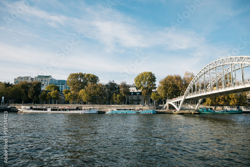 Looking Out across the Seine river to the riverbank and buildings on a clear day © MylesK