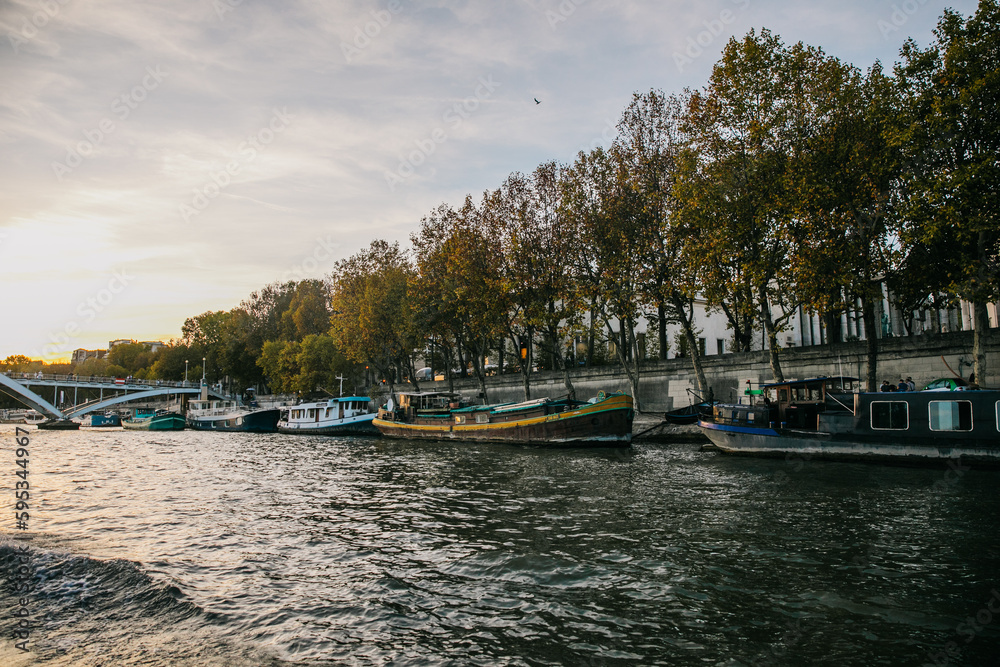 Looking Out across the Seine river to the riverbank and buildings on a clear day Looking Out across the Seine river to the riverbank and buildings on a clear day