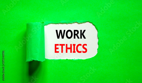 Work ethics symbol. Concept words Work ethics on beautiful white paper. Beautiful green table green background. Business and Work ethics concept. Copy space.